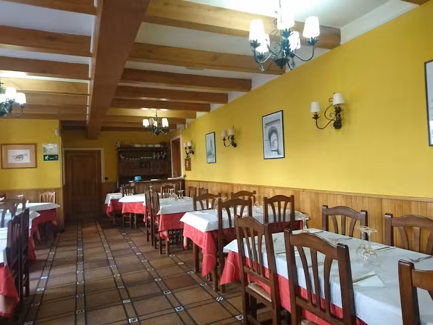 Mes&oacute;n el arco